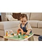 3333181121_2026_TinyLove__Wooden_Activity_Table_FarmersFunday__lifestylimage_girlstandingplaying